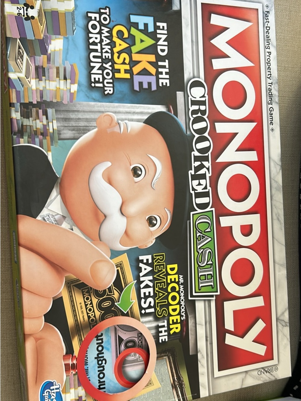 Hasbro Monopoly Crooked Cash Board Game - Red, White, Green, Black